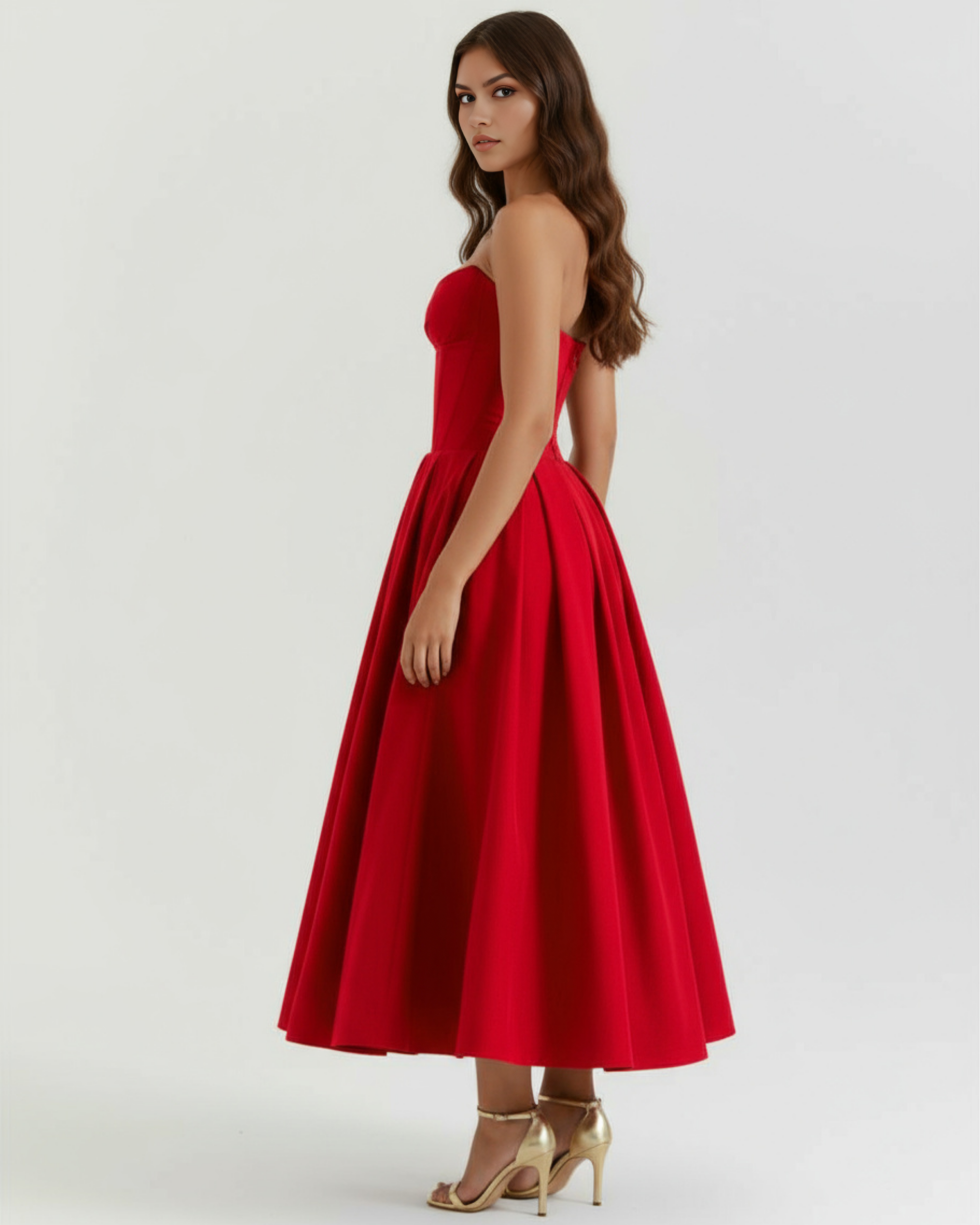 Red strapless corset midi dress shown in side view with flared hem